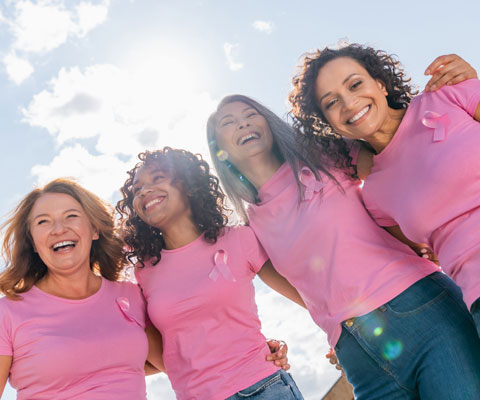A Group Of Women Wearing Pink